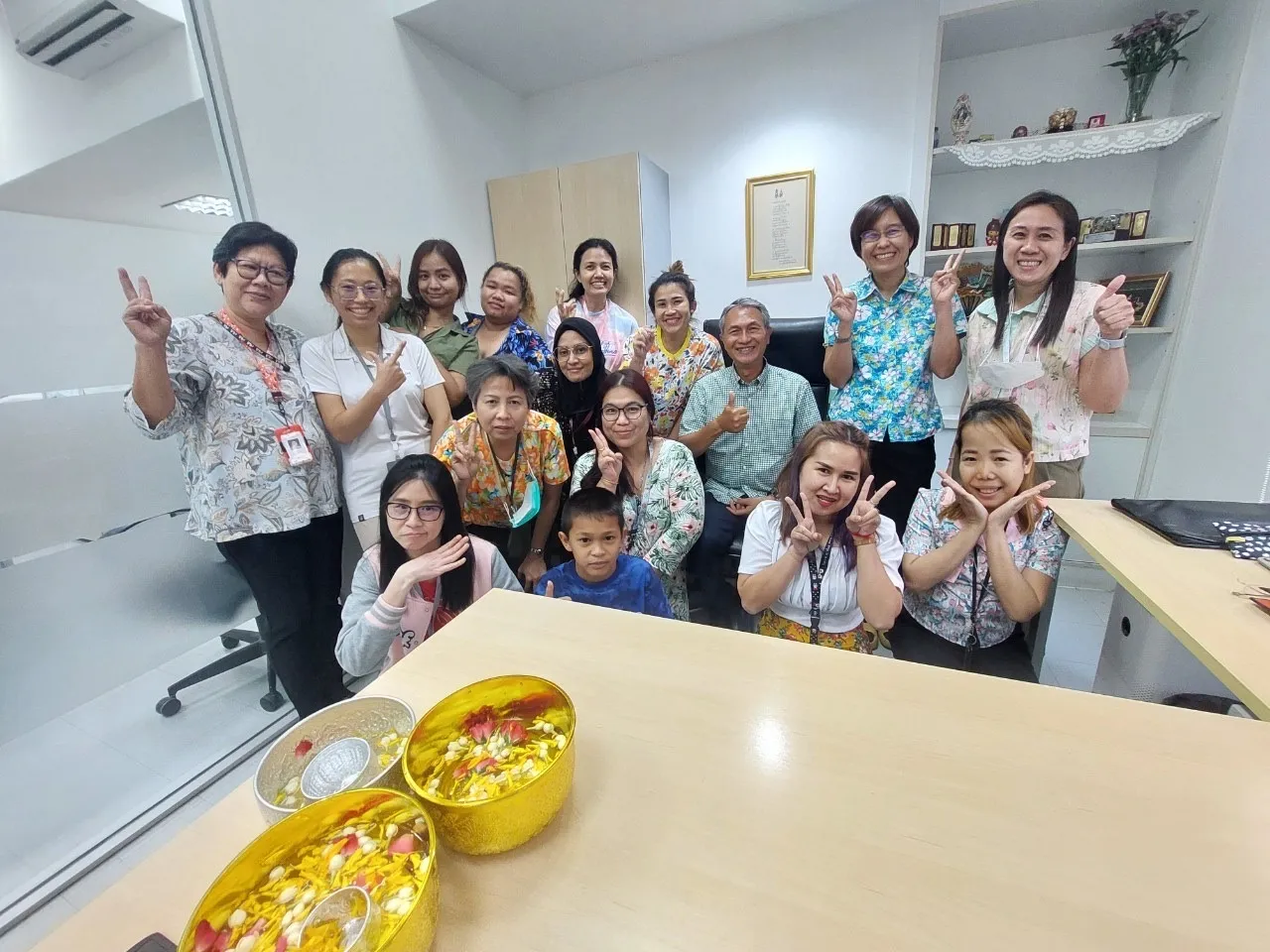 CCS staff celebrating together at the office